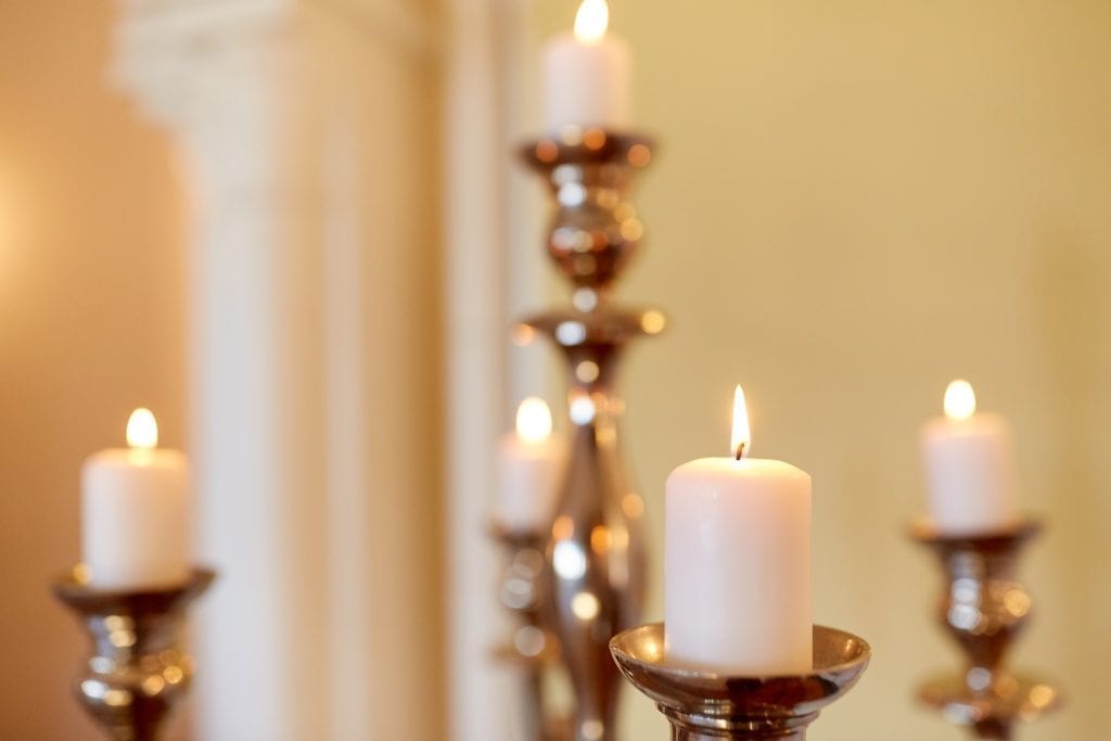 Candles burning in church