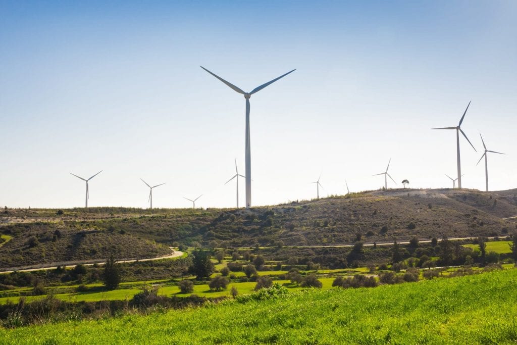 Wind mills during bright summer day